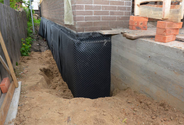 Happy homeowners after waterproofing job in Reading